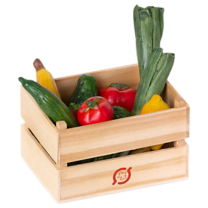 The Maileg Veggies & Fruits by Maileg is a beautifully crafted organic food crate, containing various fresh vegetables such as tomatoes, cucumbers, zucchini, and leeks. This wooden crate adds a rustic charm to any kitchen.