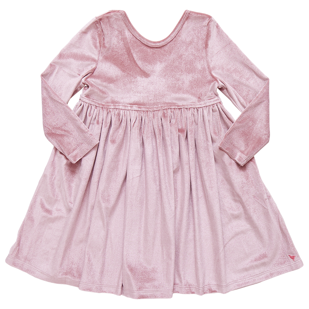 Pink Chicken Girls' Velour Steph Dress: A luxurious long-sleeve pink velvet dress from Pink Chicken, featuring an empire waist and a fully gathered flared skirt, displayed against a plain white background.