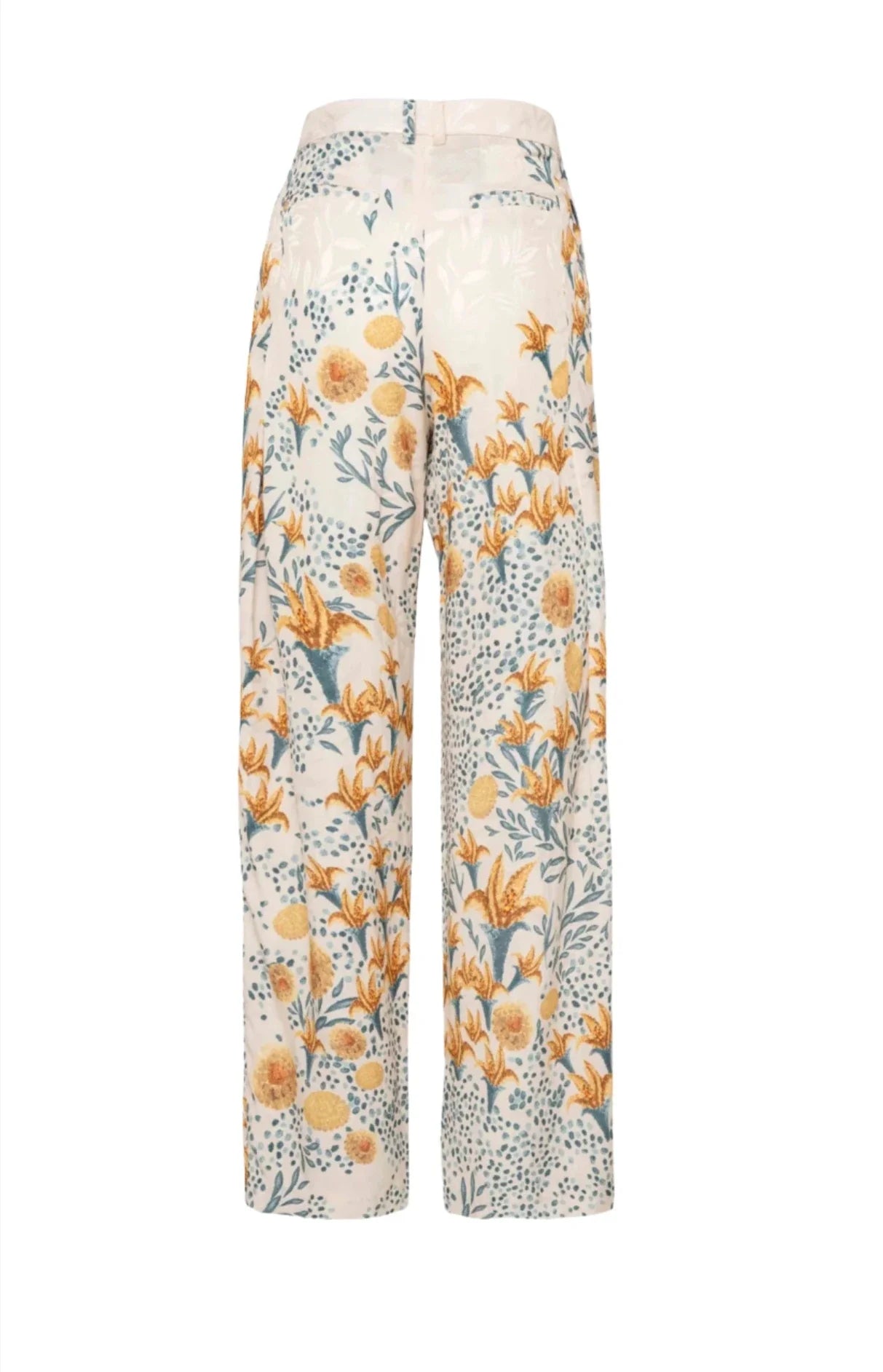 Back view of the Agua By Aguabendita Florecer Pant featuring a floral pattern in yellow and blue tones, with a wide leg cut.