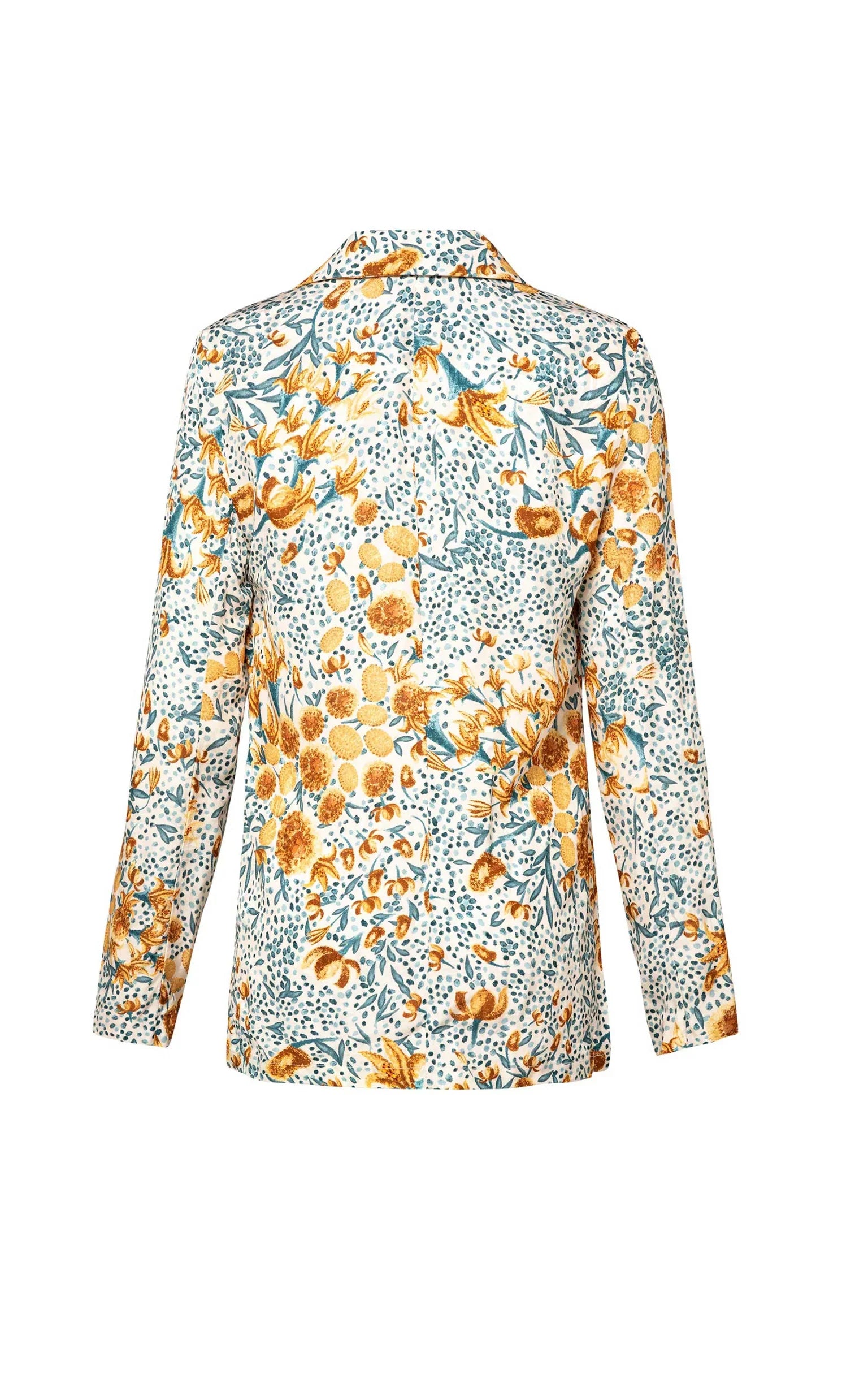 Back view of the Agua By Aguabendita Silice Shirt, a long-sleeve jacket with a floral pattern featuring yellow and orange flowers and green leaves, paired effortlessly with Florecer Capullo trousers for a versatile look.