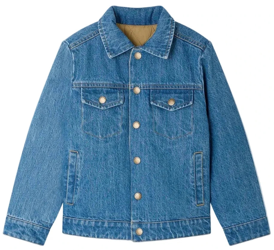 The Bonpoint Boys’ Marvin Reversible Jacket with Embroidery on the Back is shown laid flat on a white background. This stylish light blue denim jacket features a classic collar, button front closure, two chest flap pockets, and two side pockets. Crafted from soft organic cotton for exceptional comfort and style.