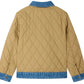 Bonpoint Boys’ Marvin Reversible Jacket with Embroidery on the Back—tan quilted organic cotton with diamond stitching, featuring blue denim collar, cuffs, and hem; shown from the back.