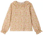 Girls’ Melusina Blouse in Liberty Fabric by Bonpoint, crafted from soft organic cotton and featuring a pink and green floral pattern on a light background, with long sleeves, ruffled collar, and cuffs.