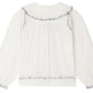 Bonpoint Girls’ Maneke Blouse with Peter Pan Collar Embroidery in white, featuring long sleeves and vintage-inspired black scalloped trim on the embroidered collar, sleeve cuffs, and waist.