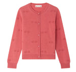 The Girls’ Manon Cardigan from Bonpoint is a pink cashmere cardigan featuring a round neckline and a delicate cherry pattern knitted throughout, blending timeless style with playful elegance for girls.