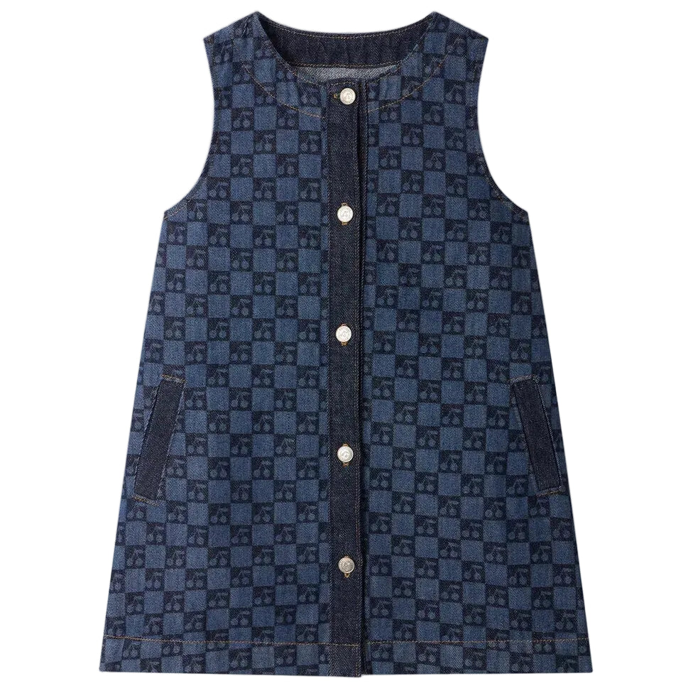 The Bonpoint Girls’ Jette Cherry Checkerboard-Print Dress, crafted from organic cotton denim, features a sleeveless design, front buttons, two hip pockets, and is displayed laid flat on a white background.