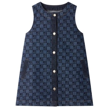 The Bonpoint Girls’ Jette Cherry Checkerboard-Print Dress, crafted from organic cotton denim, features a sleeveless design, front buttons, two hip pockets, and is displayed laid flat on a white background.