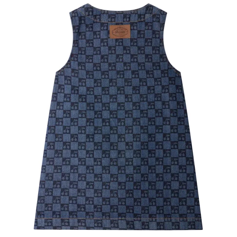 The Girls’ Jette Cherry Checkerboard-Print Dress by Bonpoint is a sleeveless style crafted from organic cotton denim, showcasing a distinctive blue checkerboard pattern and accented with a brown rectangular patch on the upper back—making it the perfect stylish girls’ dress for any occasion.
