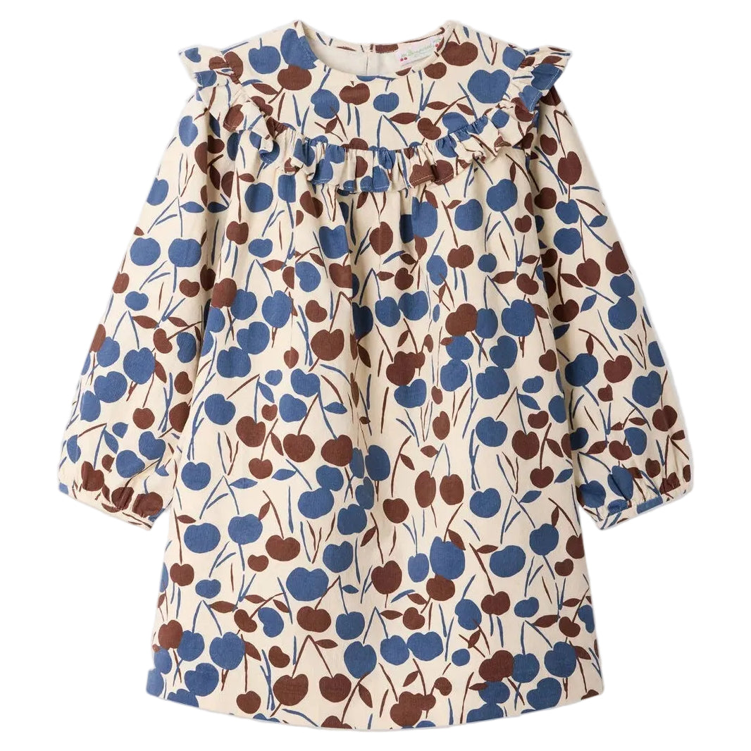 Girls’ Bevika Dress in Organic Cotton Velvet by Bonpoint—this elegant long-sleeve cream dress features a blue and brown floral pattern, ruffled collar, and gathered yoke detail, making it a charming choice for any occasion.