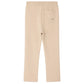 Back view of the beige Girls’ Dalila Joggers by Bonpoint, featuring an elastic waistband and a single patch pocket on the right side, designed in a comfortable flared-leg silhouette.