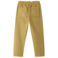 The Girls’ July Pants by Bonpoint are beige straight-leg pants for girls, made from organic cotton with an elastic waistband and two back patch pockets, pictured from the rear.