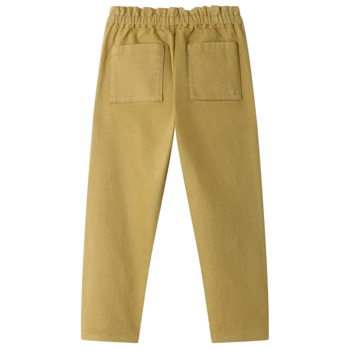 The Girls’ July Pants by Bonpoint are beige straight-leg pants for girls, made from organic cotton with an elastic waistband and two back patch pockets, pictured from the rear.