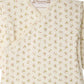 Bonpoint’s Baby Girl’s Timao Set features a cream-colored kimono top adorned with a charming cherry print, side snap-button fastening for easy dressing, and the signature Bonpoint label at the neckline.