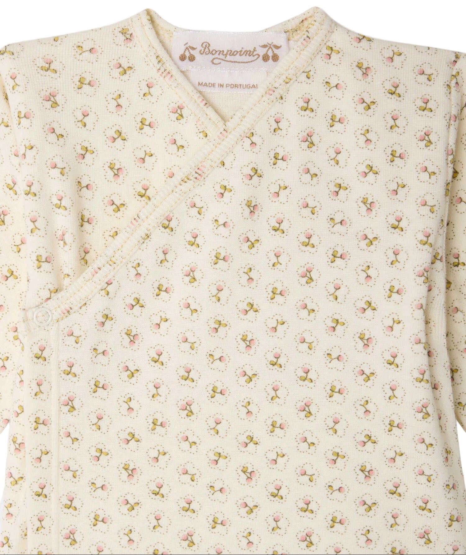 Bonpoint’s Baby Girl’s Timao Set features a cream-colored kimono top adorned with a charming cherry print, side snap-button fastening for easy dressing, and the signature Bonpoint label at the neckline.