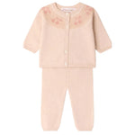 Dress your little one in the Bonpoint Baby Girls’ Jenny Set with Round Collar and Cherry Jacquard—a delightful light pink knit outfit featuring a long-sleeve buttoned cardigan adorned with a subtle cherry jacquard pattern at the neckline, paired with matching pants. This charming cardigan and pants set is perfect for babies.