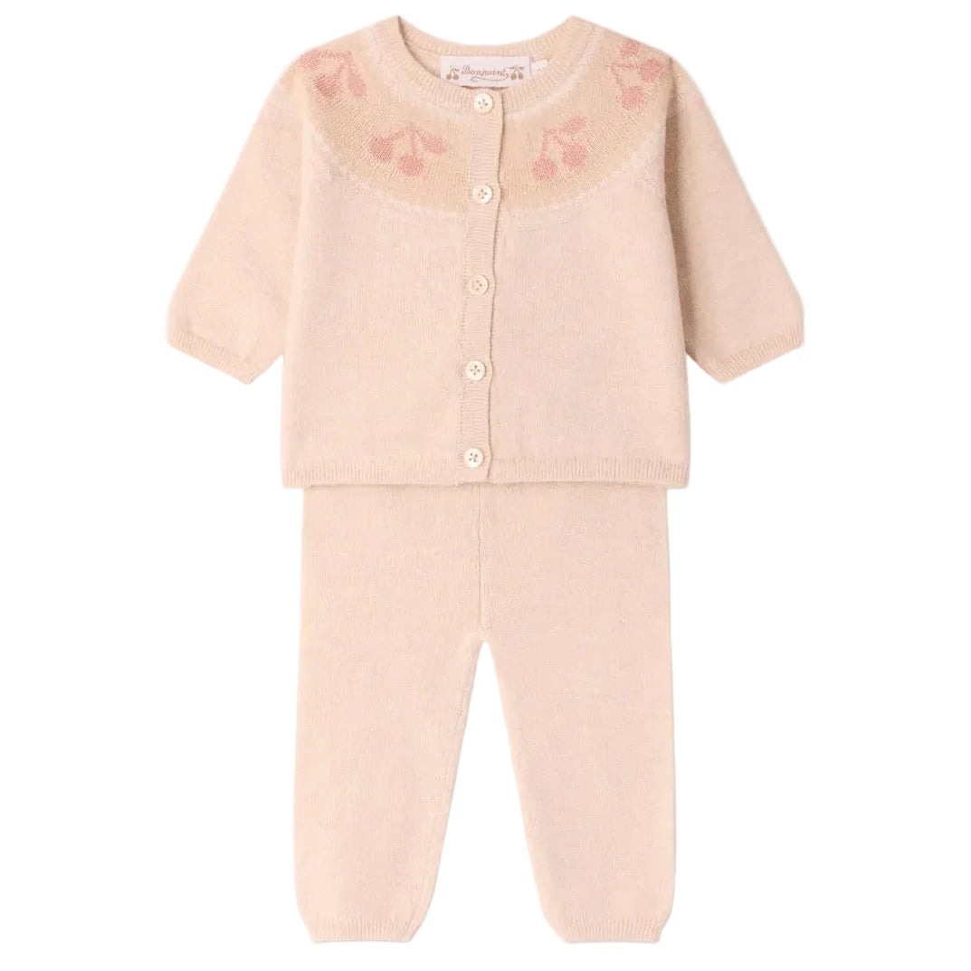 Dress your little one in the Bonpoint Baby Girls’ Jenny Set with Round Collar and Cherry Jacquard—a delightful light pink knit outfit featuring a long-sleeve buttoned cardigan adorned with a subtle cherry jacquard pattern at the neckline, paired with matching pants. This charming cardigan and pants set is perfect for babies.