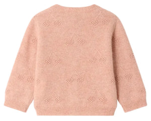 The Bonpoint Baby Girls’ and Girls’ Tibile Cardigan with Cherries in Cashmere is shown from the back in light pink, featuring a loose fit, long sleeves, ribbed cuffs and hem, and a subtle textured pattern across the fabric.