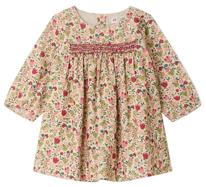 The Bonpoint Baby Girls’ and Girls’ Félicie Dress features long sleeves, a charming pink, green, and beige floral pattern, hand-embroidered smocking across the chest, and a loose, comfortable fit.