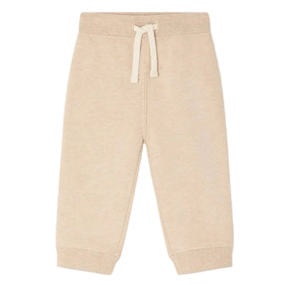 The Bonpoint Baby Girls’ and Girls’ Bambo Beige Jogging Bottoms, crafted from soft organic cotton fleece, feature ribbed cuffs, an elastic waistband with a drawstring, and a delicate embroidered cherry detail—shown on a white background.