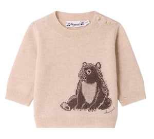 Bonpoint’s Baby and Kids’ Almire Pullover in beige is crafted from soft cashmere and features a charming sitting brown bear motif on the front, along with two buttons on one shoulder near the collar.