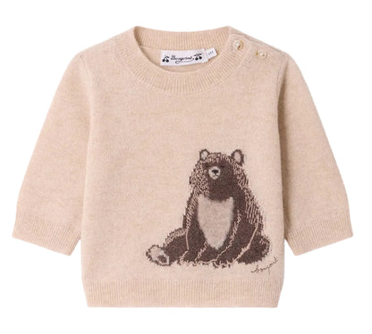 Bonpoint’s Baby and Kids’ Almire Pullover in beige is crafted from soft cashmere and features a charming sitting brown bear motif on the front, along with two buttons on one shoulder near the collar.