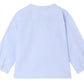 The Bonpoint Baby Boys’ and Boys’ Matis Shirt, shown here in light blue from the back, features hand-embroidered fir trees and hedgehogs, a straight hem, buttoned cuffs, and is perfect for babies.