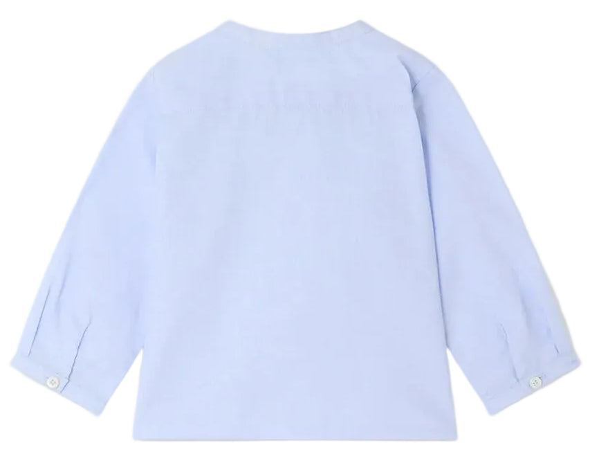 The Bonpoint Baby Boys’ and Boys’ Matis Shirt, shown here in light blue from the back, features hand-embroidered fir trees and hedgehogs, a straight hem, buttoned cuffs, and is perfect for babies.