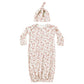 The Quincy Mae Baby Girls' Bamboo Baby Gown & Hat Set includes a long-sleeve gown with fold-over mitts, elastic bottom, and a matching knotted hat, both featuring a pink and white floral pattern.