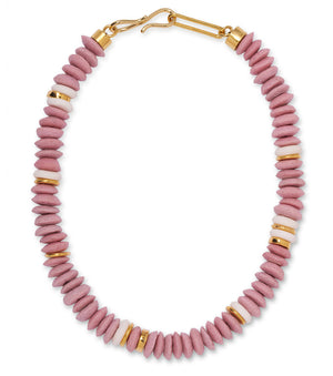 The Laguna Necklace by Lizzie Fortunato features pink, gold, and off-white recycled glass beads in a repeating pattern, accented with a gold clasp.