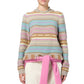 A person wearing the Guest in Residence Western Stripe Crew with fringe hem and a pink sweater tied at the waist, set against a white background.