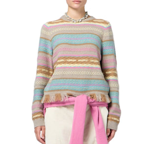 A person wearing the Guest in Residence Western Stripe Crew with fringe hem and a pink sweater tied at the waist, set against a white background.