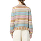 A person wearing the Guest in Residence Western Stripe Crew sweater with a fringe hem and light-colored pants, shown from the back against a white background.