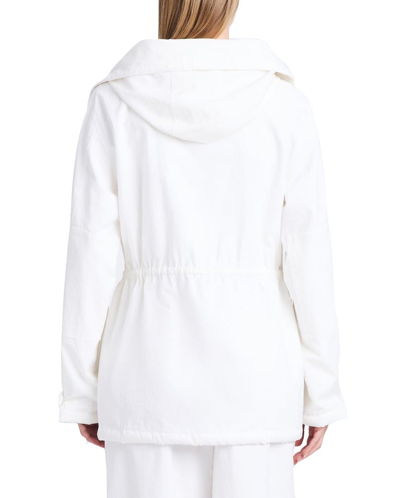 A person wearing a white hooded Proenza Schouler Nina Coat with an adjustable waist, viewed from the back.