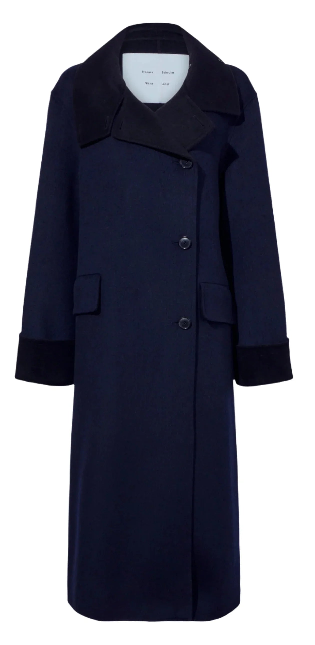 The Proenza Schouler Constance Pinstripe Melton Coat, an elegant piece by Proenza Schouler, features a dark navy design with a black collar and cuffs. It includes three buttons, two front pockets, and is crafted from Pinstripe Melton fabric. A self-tie belt adds an extra touch of sophistication to this stylish coat.