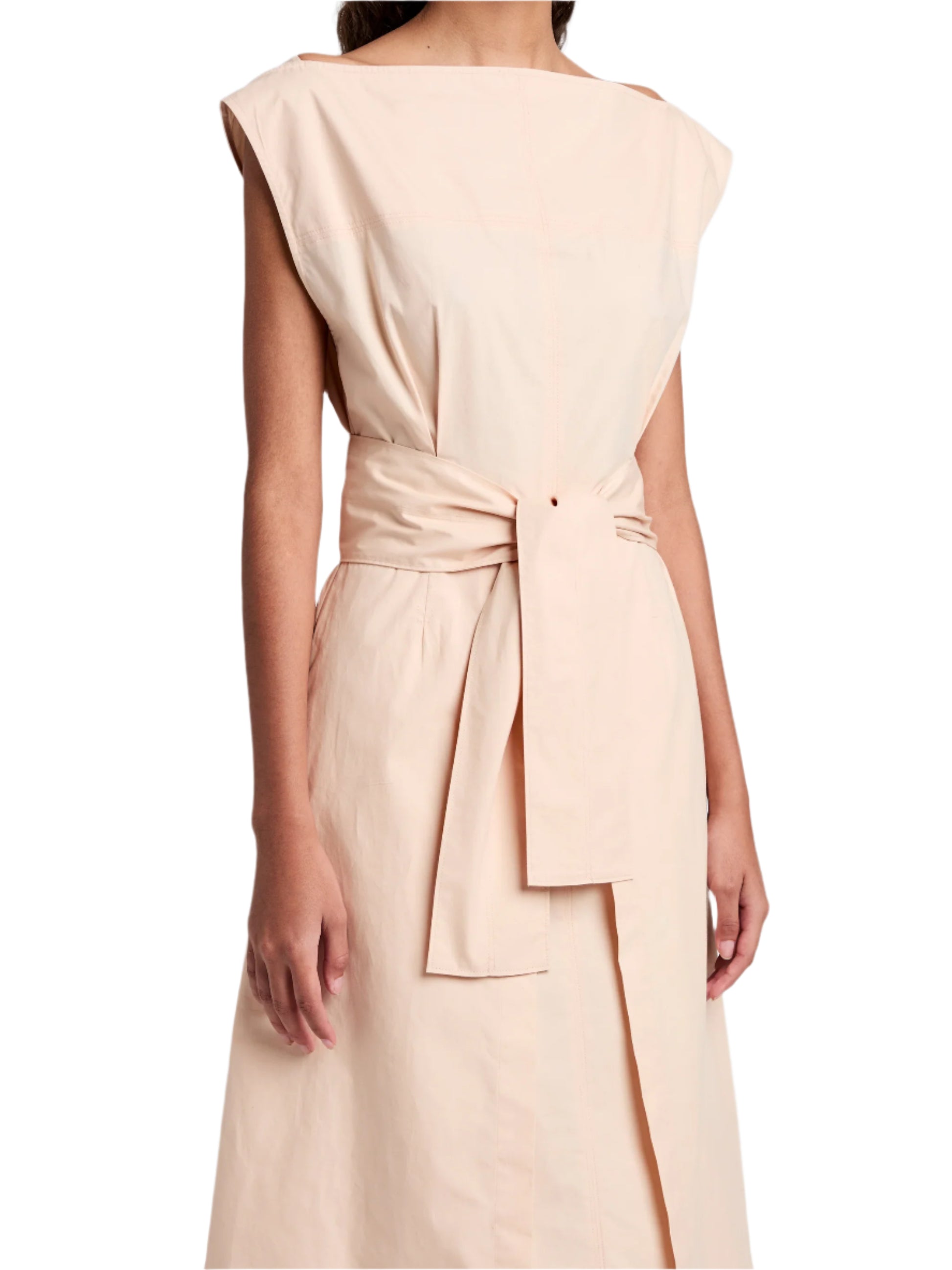 The Proenza Schouler White Label Caro Dress Brushed Poplin showcases a chic sleeveless A-line design in beige with a self-tie waist belt, ideal for highlighting your figure against a crisp white backdrop.