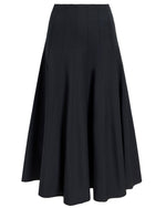 The Heidi Skirt by Proenza Schouler White Label is a black, knee-length A-line skirt made from Tech Cotton, featuring panel detailing and a flared hem.