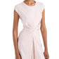 A woman wears the Miranda Dress by Proenza Schouler White Label—a light pink, short-sleeve Linen Slub dress with an A-line silhouette and gathered waist—standing against a plain white background.