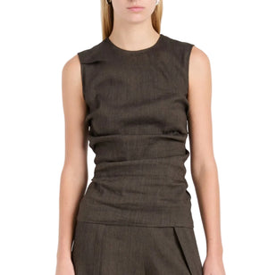 Model wearing the Anoushka Slub Linen Top by Proenza Schouler White Label, a sleeveless dark brown fitted piece paired with matching pants, posed against a white background.