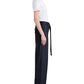 Model in profile wears Proenza Schouler White Label Lina Pant—a high-waisted, stretch twill wide-leg style with adjustable belt—paired with a white short-sleeve top and open-toe heels against a white background.