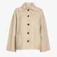 A beige, long-sleeve, button-up Nelly Melange Merino Jacket by Proenza Schouler White Label, featuring large front pockets and a wide collar, displayed on a plain white background.