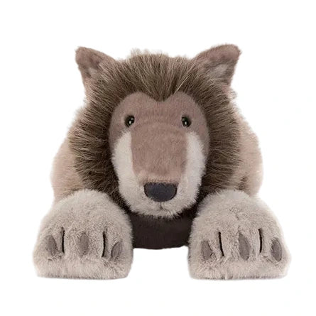 Ulrich Wolf by Jellycat—plush toy wolf with large paws and furry mane, lying down and viewed from the front on a white background.