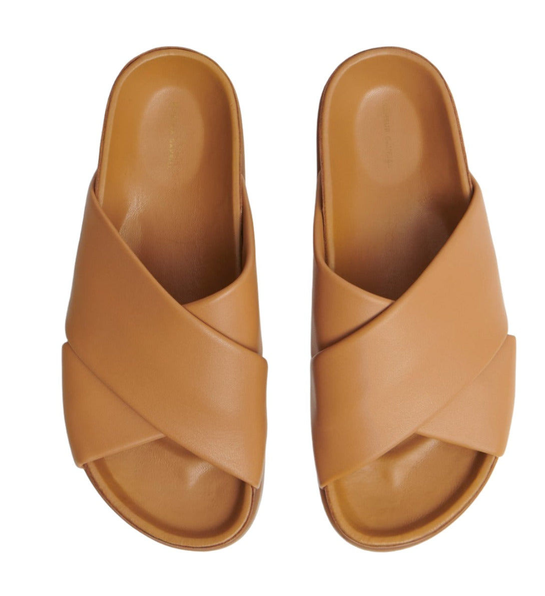 A pair of tan Mansur Gavriel Everyday Slide Sandals with crisscross straps, viewed from above on a white background.