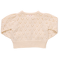 The Girls' Connie Sweater by Pink Chicken features a cream chevron eyelet pattern and puffed sleeves. Shown from the back on a white background, this pointelle cardigan adds delicate texture to any girl's wardrobe.
