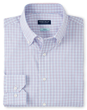 Folded long-sleeve button-down men's Peter Millar Seawell Cotton Sport Shirt with a pink, blue, and white plaid pattern, featuring a collar tag that reads "Peter Millar." Tailored Fit for comfort and style with Flex Finish for ease of movement.