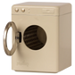 A beige, front-loading Maileg Washing Machine, Miniature with its door open reveals the empty drum inside. The metal machine, from the renowned brand Maileg, features two control knobs on the top left corner, ready to tackle your laundry needs.