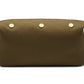 Bennett Winch's Canvas Wash Bag in olive green features a YKK brass zipper, three gold buttons on one side, and is equipped with a brown leather strap at each end.