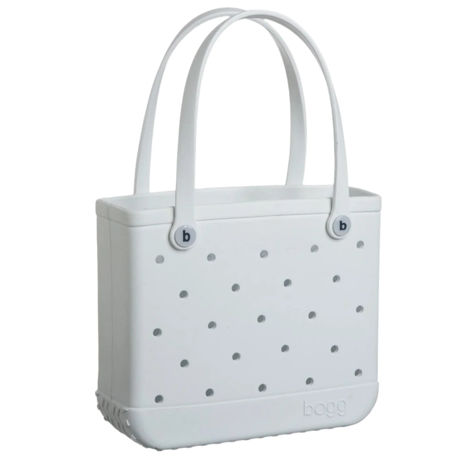 The Baby Bogg Bag from Bogg Bags is a durable gray tote designed with stylish perforated holes and adorned with two round button details on the handles, making it both fashionable and washable.