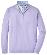 A Peter Millar Coolspun Cotton Quarter-Zip Sweater in light purple is layered over a blue and white checkered shirt.