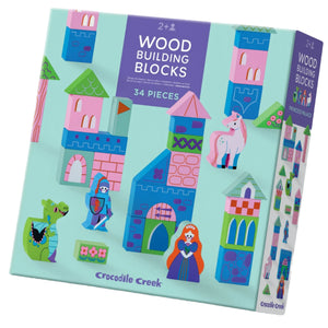 The Crocodile Creek Build & Play Wood Blocks Princess Palace set includes 34 wooden pieces and features castles, a princess, knight, unicorn, and dragon—perfect for creative play.
