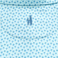 Close-up of the light blue fabric from the Johnnie-O Woods Polo by Johnnie-O, featuring a small pattern of trees and a surfing design with a figure holding a surfboard at the center. This polo is crafted with moisture-wicking properties, making it perfect for active beach days.